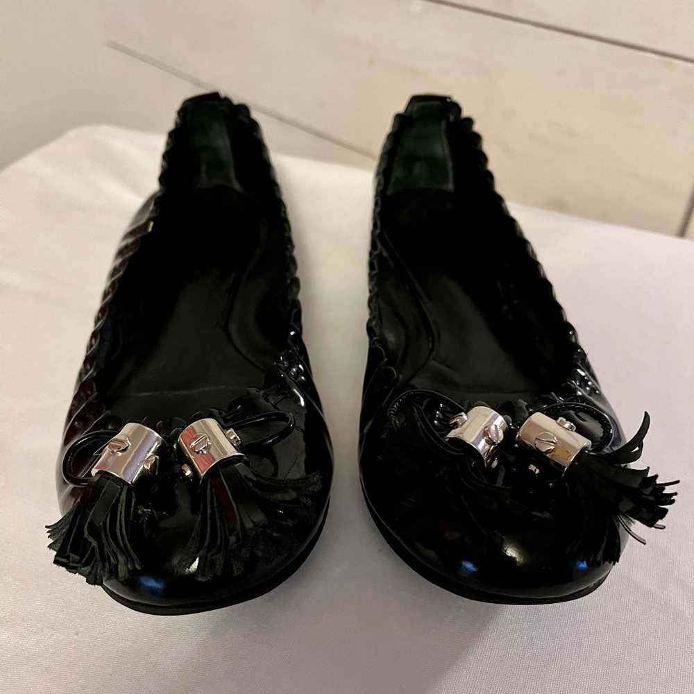 Tory Burch black flats with tassels